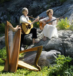 Janine and Susan playing guitar