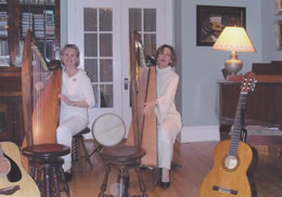 Janine and Susan performing at a house concert