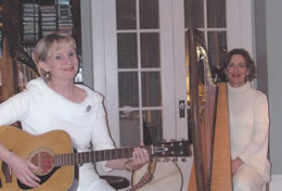Janine on guitar, Susan on harp