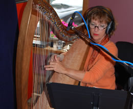 Susan in the recording studio, concentrating